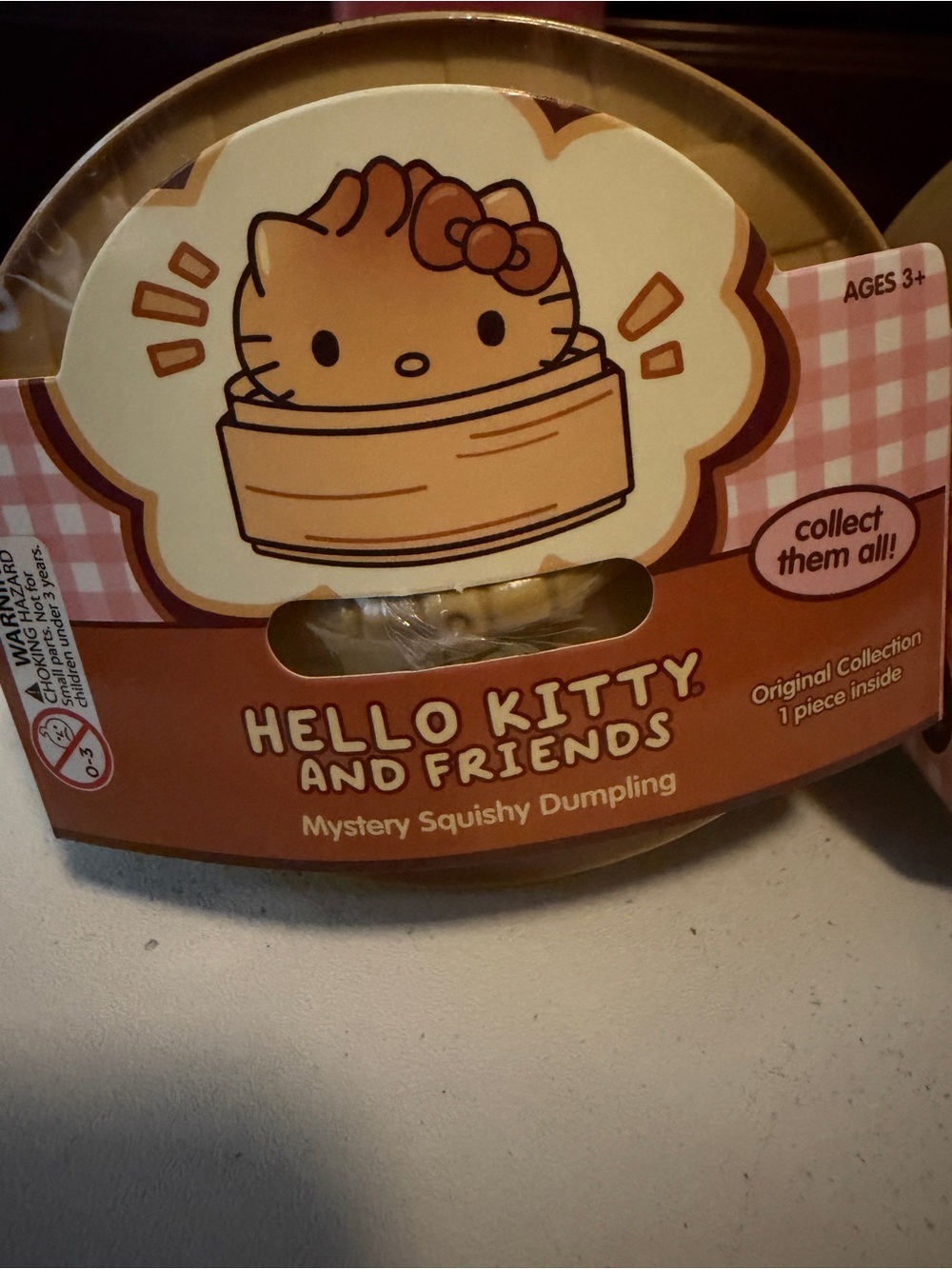 Hello Kitty Mystery Squishy Dumpling Toy - Brown Pink